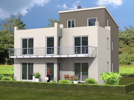 Ein modernes zweistöckiges Haus mit Flachdach, großen Fenstern und Balkon liegt in der lebendigen Landschaft von Dresden. Eine Person steht neben einer Terrasse inmitten eines gepflegten Gartens. Dieses Massivhaus Sachsen verkörpert zeitgenössisches Design unter dem klaren blauen Himmel.