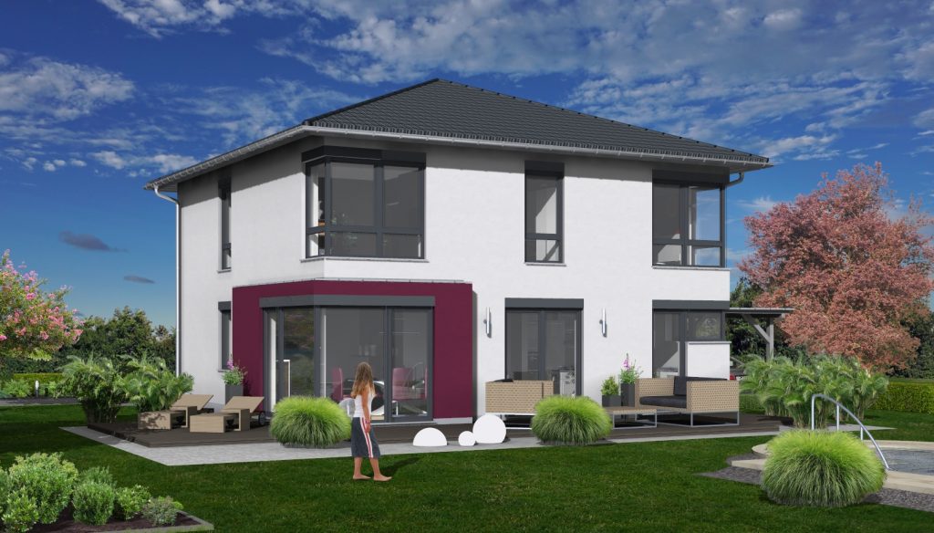 Ein modernes zweistöckiges Haus, das an ein stilvolles Fertighaus aus Dresden erinnert, besticht durch weiße Wände und ein dunkles Dach. Es verfügt über große Fenster und eine Terrasse mit Gartenmöbeln. Eine Person steht auf dem grünen Rasen, umgeben von Bäumen und Sträuchern unter einem teilweise bewölkten Himmel.